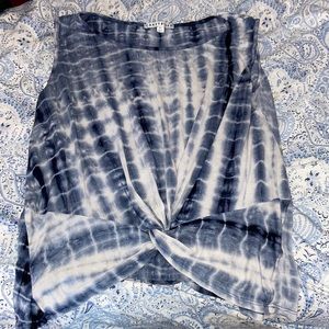 Medium dark blue tank top with swirl at bottom